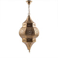 Amalu sconce in pierced brass on a white studio background
