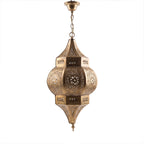 Amalu sconce in pierced brass on a white studio background