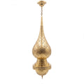Asafu flame-shaped brass pendant on a white studio background
