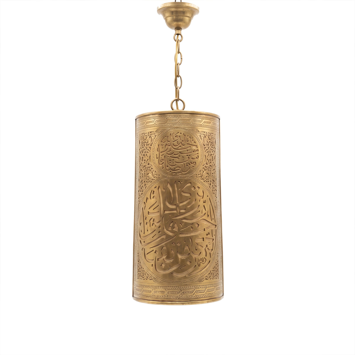 Aya calligraphy sconce in brass on a white studio background