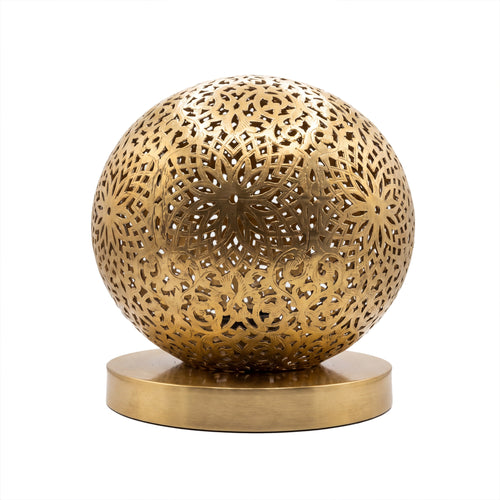 Ayyur engraved and pierced brass ball table lamp on a white studio background