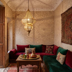 Badi pendant lit under the arcades of a Moroccan riad