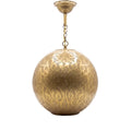 Badr pendant, a hand-pierced brass sphere, unlit on a white studio background