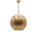 Chourouk pendant, an open punched brass ball, on a white studio background