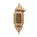 Fajr sconce, a tall pierced brass wall light on a white studio background