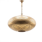 Hana pierced brass pendant lamp on a white studio background