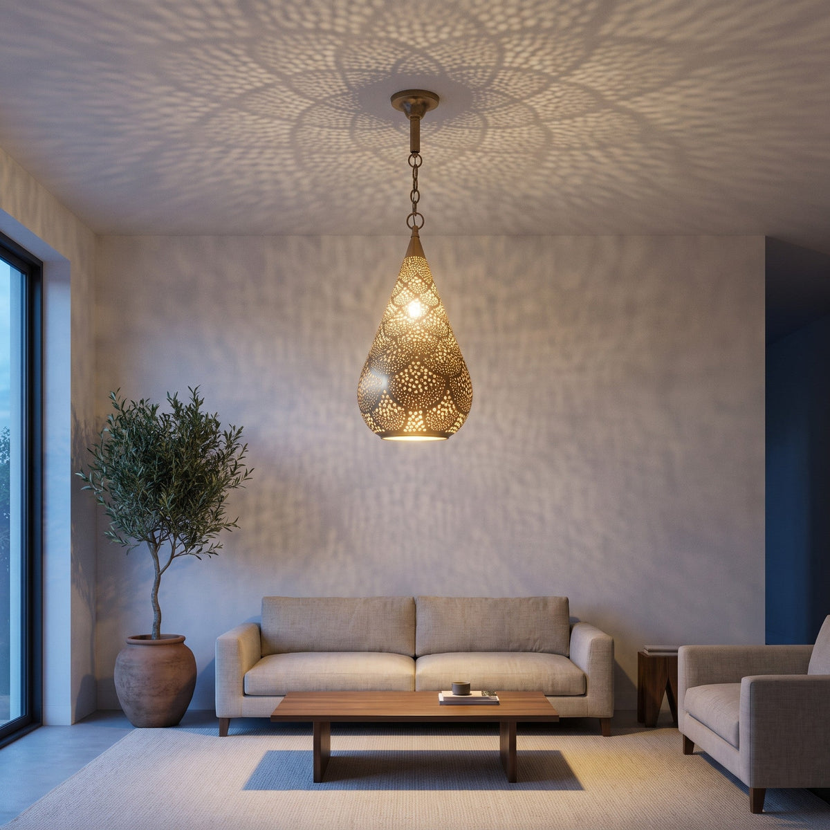 Itri pierced brass pendant hanging in a modern living room