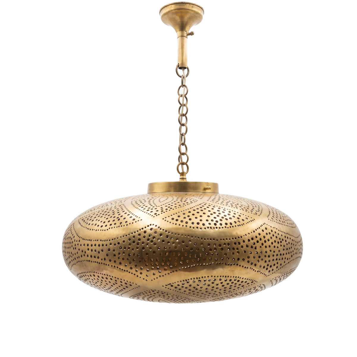 Layla pendant, a pierced brass shade with leaf motifs, on a white studio background