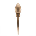 Menara pierced brass wall sconce in gold, tall tapered torch shape, on a white studio background
