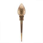 Menara pierced brass wall sconce in gold, tall tapered torch shape, on a white studio background
