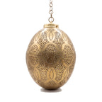 Merzouga brass lantern with hand-punched circles on a white studio background