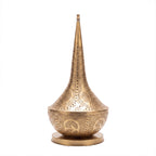 Nassim tall pierced brass table lamp photographed on a plain white studio background