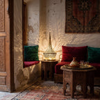 Nassim table lamp glowing in the corner of a Moroccan riad courtyard