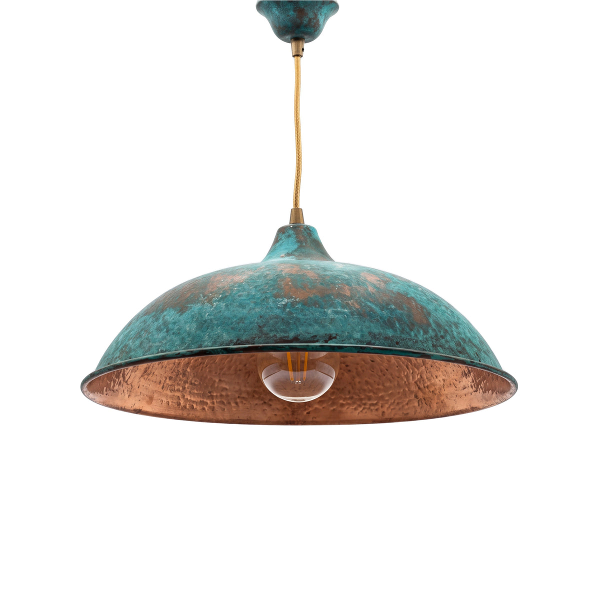 Nila oxidized copper pendant with green patina on a white studio background