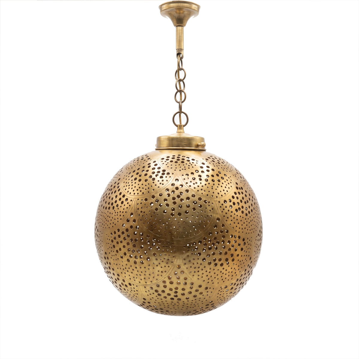 Qamar pendant, a pierced brass ball, on a white studio background