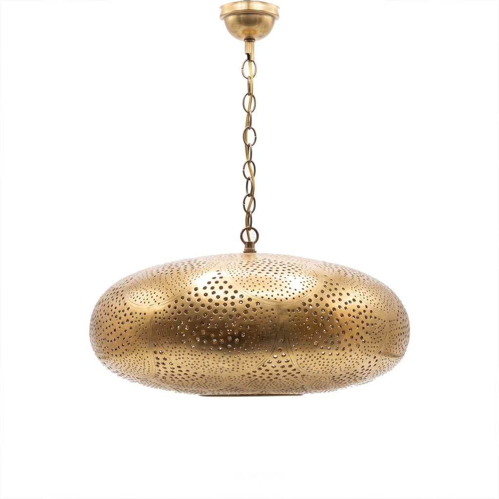 Saada pierced brass pendant on a white studio background