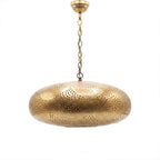 Saada pierced brass pendant on a white studio background