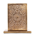 Sabah eclipse-shaped engraved brass table lamp on a white studio background