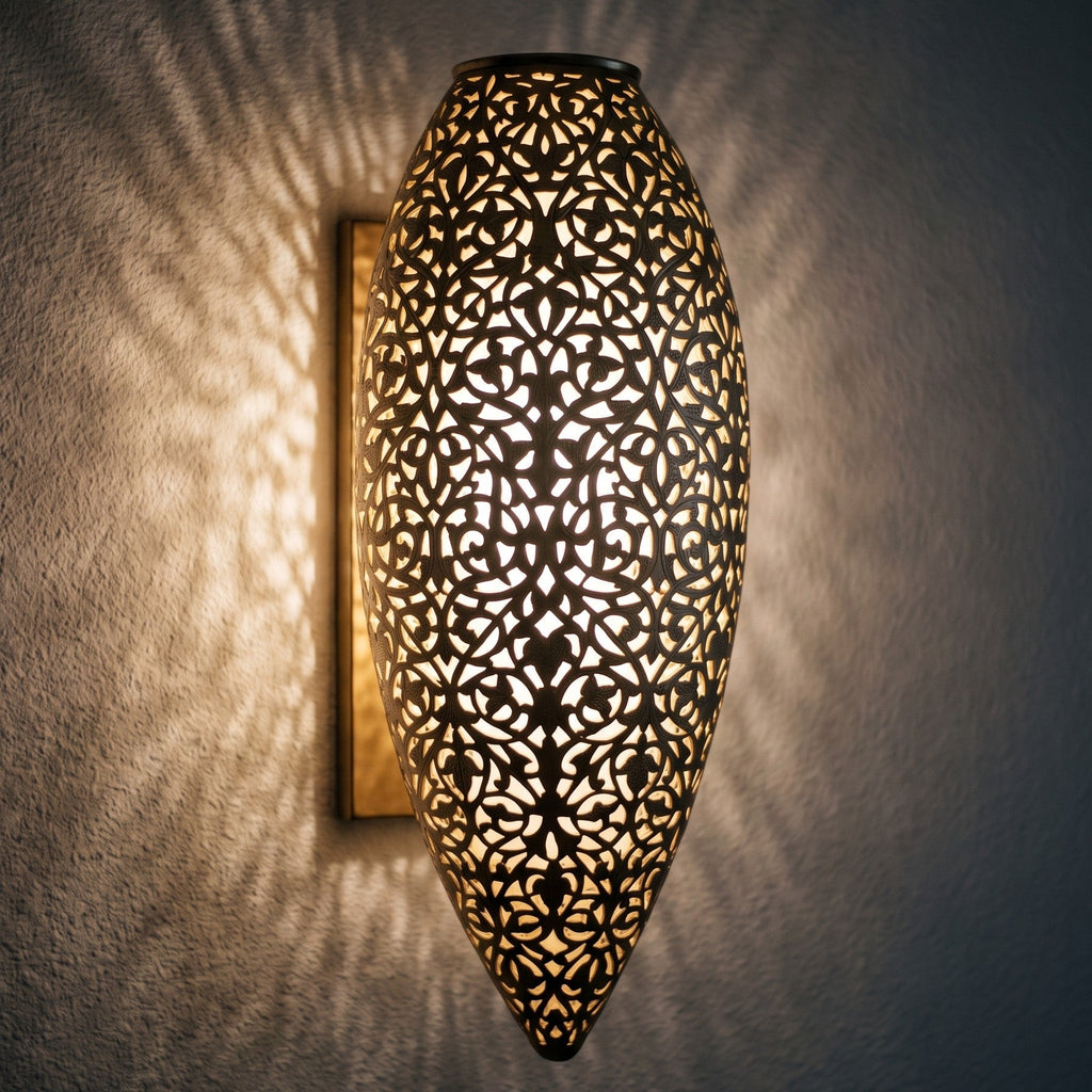 Close view of the lit Sana sconce, geometric piercing and floral dome glowing