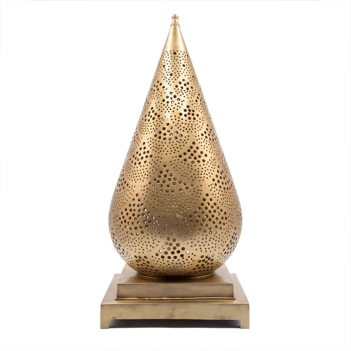 Siraj pierced brass table lantern on a white studio background