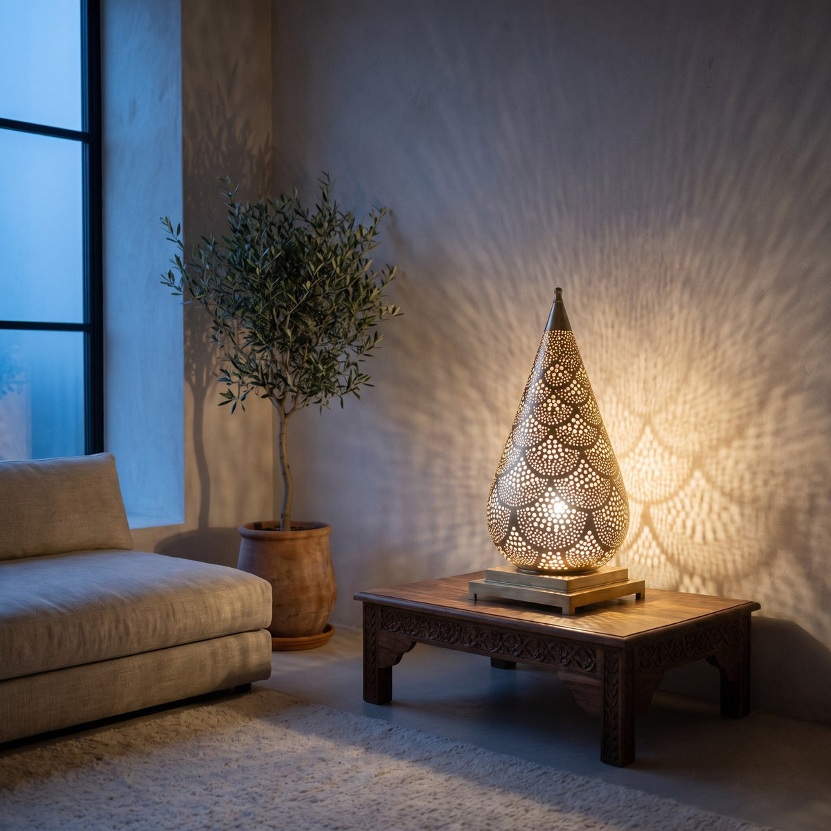 Siraj lantern lit on a shelf in a modern living room, light pattern on the wall
