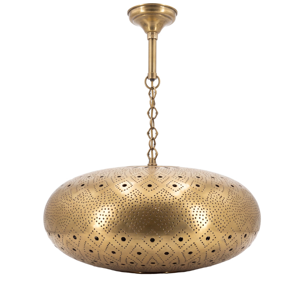 Tafat pierced brass pendant lamp on a white studio background