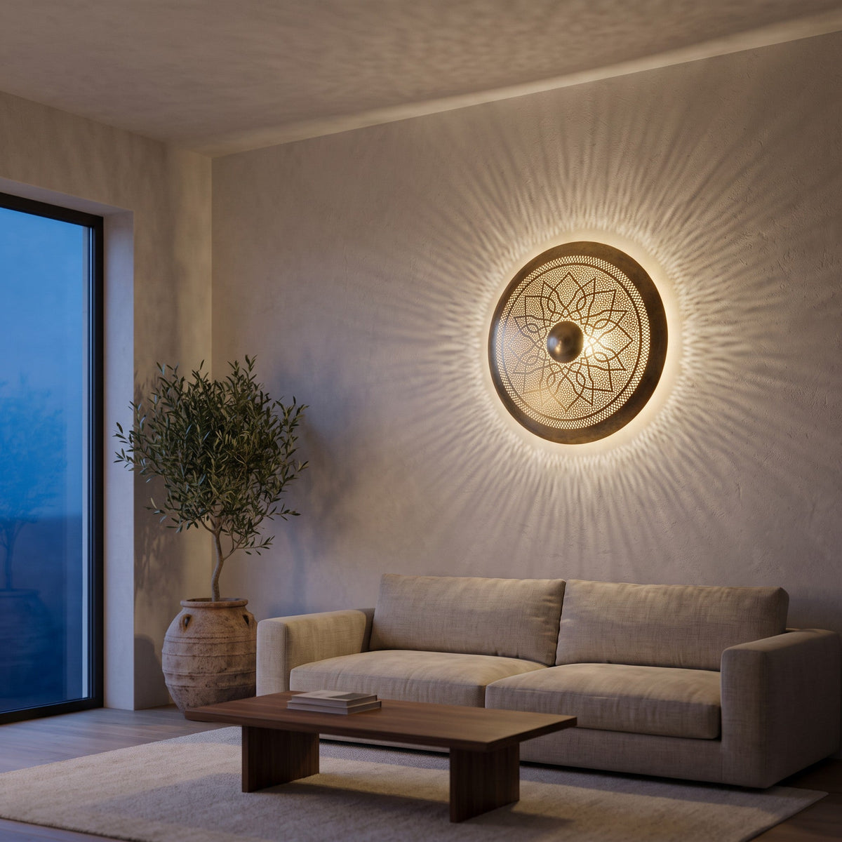 Tafraout disc sconce lit on the wall of a modern hallway