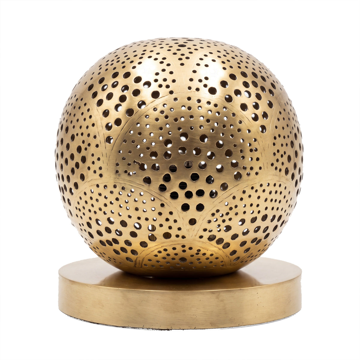 Tala pierced brass sphere table lamp on a white studio background