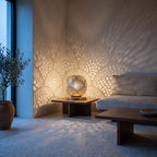 Tala brass table lamp on a side table in a modern living room