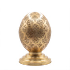 Tamment pierced brass table lantern on a white studio background