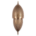 Tarz sconce in pierced brass on a white studio background