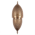 Tarz sconce in pierced brass on a white studio background