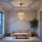 Thouraya pendant hanging over an entryway table in a modern home