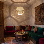 Thouraya pendant glowing in a Moroccan riad