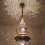 Close detail of the lit Toubkal, chiseled tiers glowing