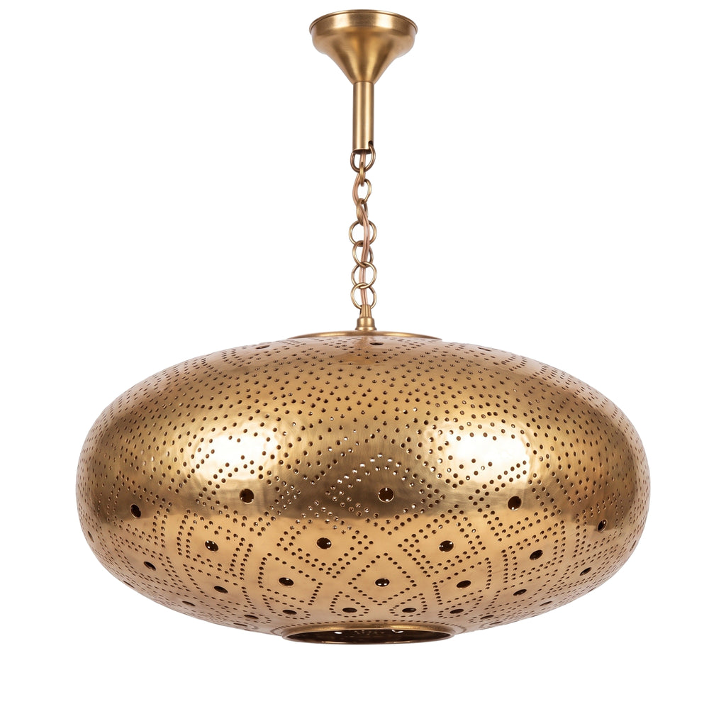 Tudert pierced brass pendant on a plain white studio background