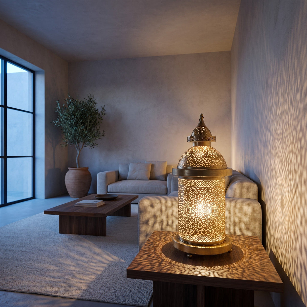 Zafran lamp lit on a desk in a modern interior, engraved pattern casting light