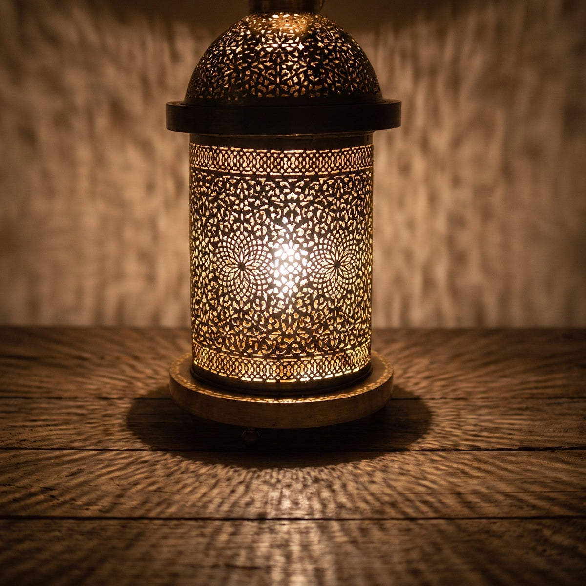 Close view of Zafran lit, engraving and piercing glowing in the brass