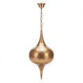 Zagora tall brass lantern with punched circles on a white studio background