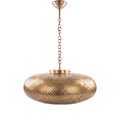 Zohra pendant, a hand-pierced brass shade, on a white studio background