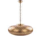 Zohra pendant, a hand-pierced brass shade, on a white studio background